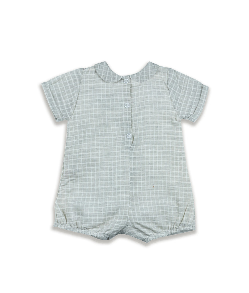Baby romper with a checkered pattern on a white background