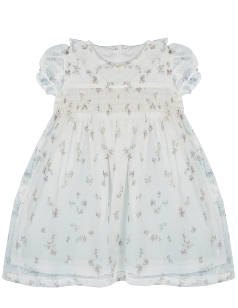 White floral dress with ruffled sleeves on a white background